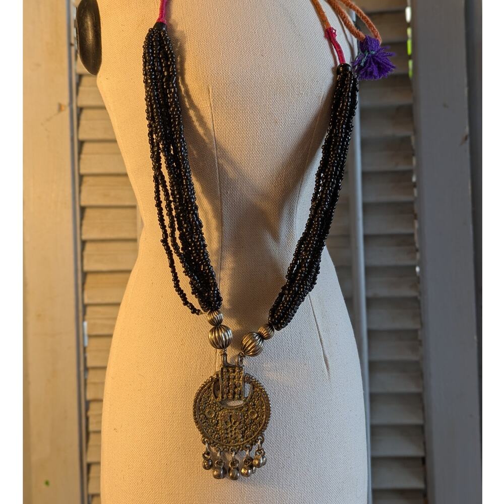 Handcrafted tribal style statement necklace with seed beads